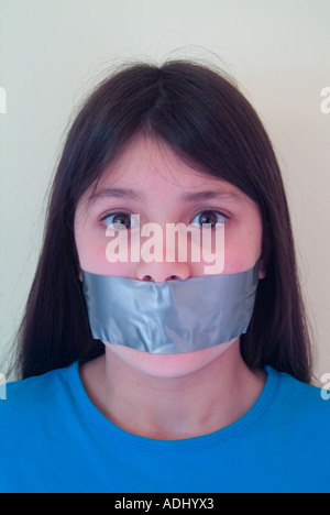 A young girl with tape over her mouth Stock Photo, Royalty Free Image ...