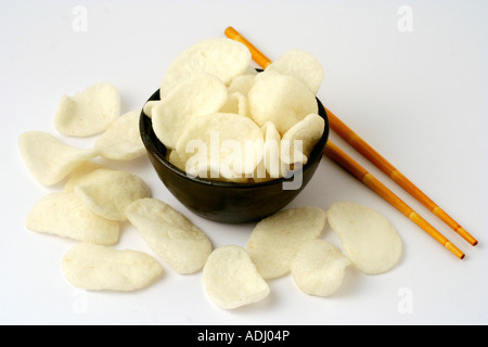 Prawn crackers in a bowl Stock Photo