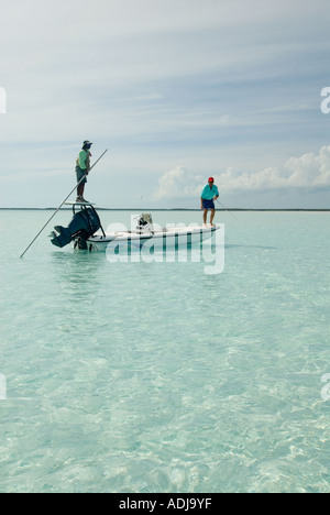 GREATER EXUMA BAHAMA Fly Fisherman Bone- Fishing in Emerald Green waters. Stock Photo