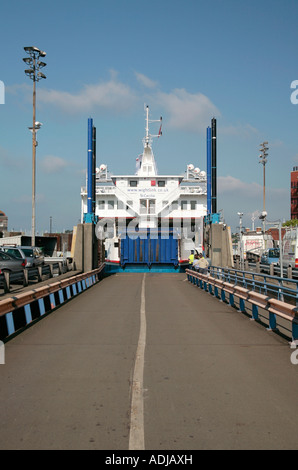 Isle of Wight car ferry docking in Portsmouth Harbour, Hampshire, UK Stock Photo