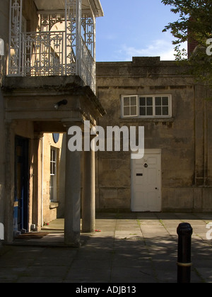 Albion Place, Bath stone architecture Georgian house with cast stone portico and wrought iron balcony off Sidmouth Street, Devizes, Wiltshire UK Stock Photo