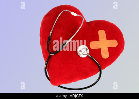 hurted heart and a stethoscope Stock Photo