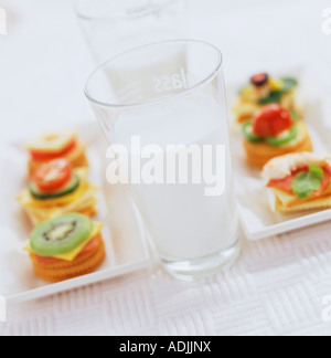 milk cup canape finger food vegetable fruit food Stock Photo