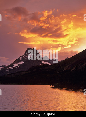 Sunset on Swiftcurrent Lake with Mount Wilbur Glacier National Park Montana Stock Photo