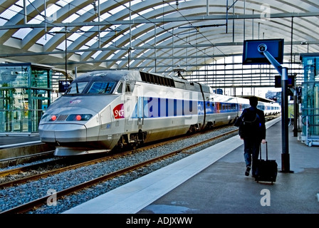 Reims France, Public Transit System "TGV Train" Station Inside SNCF Train Platform BusinessMan Running Catch Train Business Travel, tourists suitcases Stock Photo
