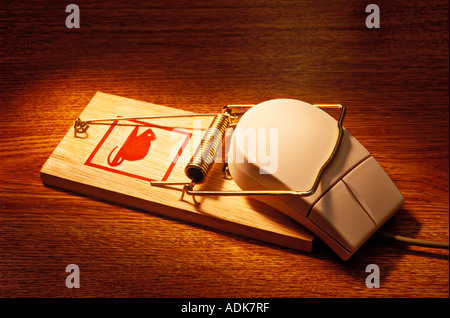 Computer mouse in mouse trap Stock Photo