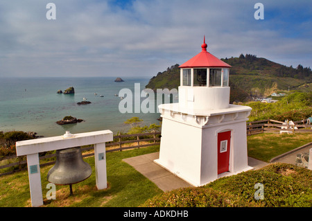 Trinidad Lighthouse with boats in harbor California Stock Photo