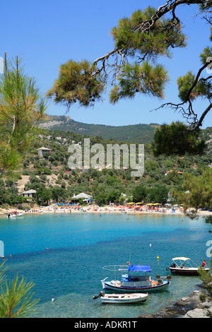 boats at an idyllic bay near Alyki on the island of Thasos in Greece Stock Photo