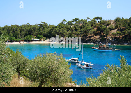 boats at an idyllic bay near Alyki on the island of Thasos in Greece Stock Photo