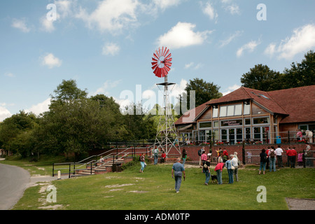 Visitors outside the Limeburners Cafe, Amberley Working Museum, Amberley, West Sussex, UK Stock Photo