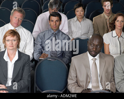 Office workers listening to presentation Stock Photo