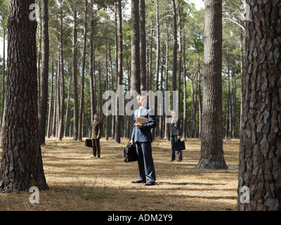 Office workers in forest Stock Photo