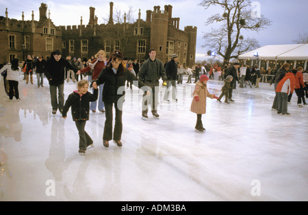 Ice Skaters At Hampton Court Palace Seasonal Ice Rink Molesey Surrey England December Stock Photo