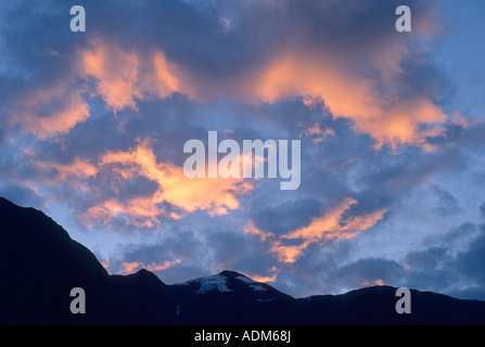 Sunset on clouds over Glacier Bay Southeast Alaska Stock Photo