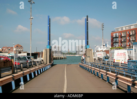Isle of Wight car ferry approaching dockside in Portsmouth Harbour, Hampshire, UK Stock Photo