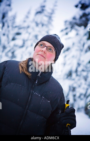 Portrait of woman cross country skiing near Girdwood Moose Meadow winter Alaska Stock Photo