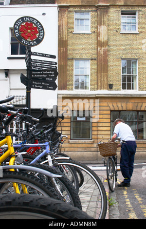 Cambridge Information Street Sign and local man. Stock Photo