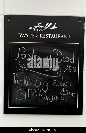 daily menu written in chalk on blackboard outside the 5 star Gwesty Cymru boutique bed and breakfast hotel Aberystwyth Wales Stock Photo