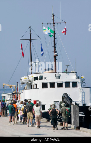 The MS Oldenburg, the Lundy island ferry, berthed on lundy island, with passengers, North Devon Stock Photo