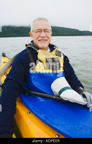 Portrait of older man in a kayak on the water Columbia River Washington Oregon USA Stock Photo