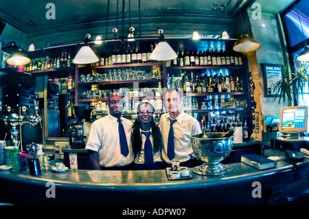 PARIS France, Male Female Waiters Behind Bar in French Bistro Restaurant, 'Le Grizzli' Café Portrait Pub Stock Photo