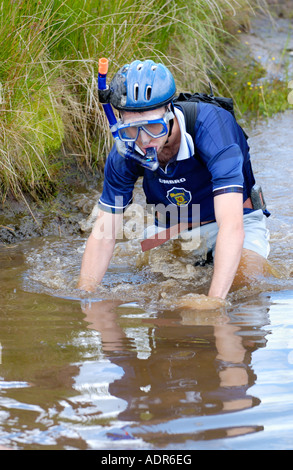 Competitor in the annual World Mountain Bike Bog Snorkelling Championships at Llanwrtyd Wells Powys UK Stock Photo