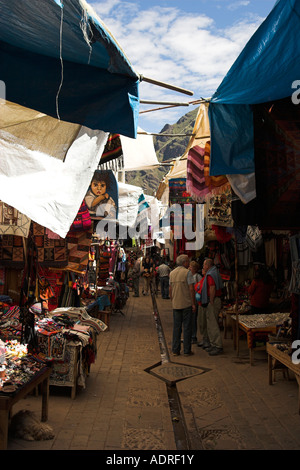 [Pisac Market], [Sacred Valley], Peru, 'South America', tourists and outdoor craft stalls selling peruvian textiles Stock Photo