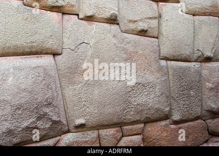Famous 12 sided stone in wall of [Palace of Inca Roca], [Calle Hatunrumiyoc], Cusco (Cuzco), Peru, 'South America', 'close up' Stock Photo