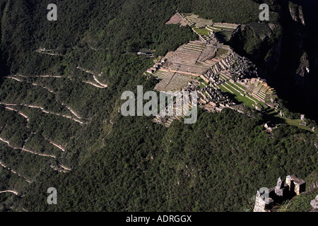 [Machu Picchu], aerial view of ancient Inca ruins and 'zig zag' mountain road from [Huayna Picchu], Peru, 'South America' Stock Photo