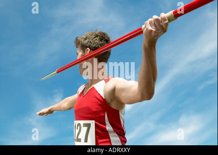 Athlete about to throw javelin, half length Stock Photo