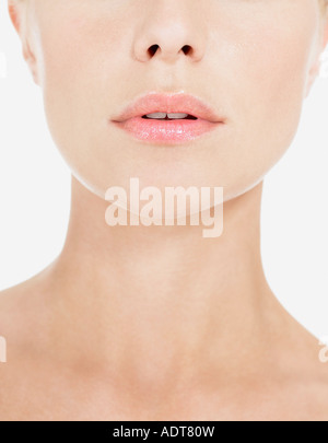 Young Woman Wearing Pink Lipstick, close up of neck Stock Photo