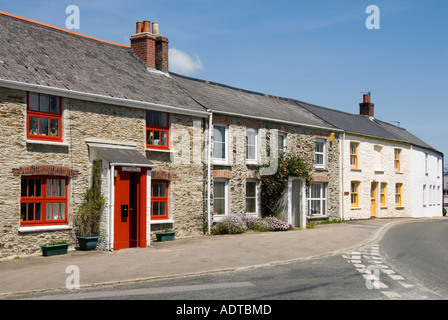 Cornish stone wall slate roof terraced cottage houses in St Just in Roseland village within Cornwall Area of Outstanding Natural Beauty England UK Stock Photo