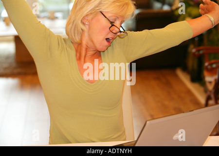 Mature Woman Stretching Model Released Stock Photo