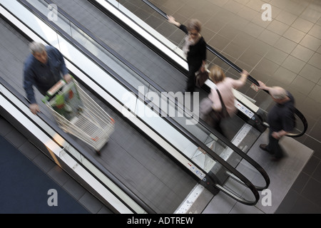 people on escalator Stock Photo