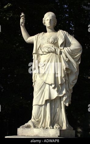 Statue of the ancient Greek goddess Athena in a garden of the Palace of Versailles. Digital photograph Stock Photo