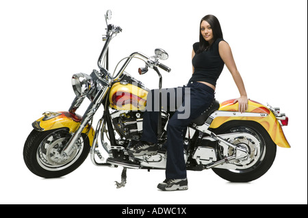 Woman sitting on motorcycle Stock Photo