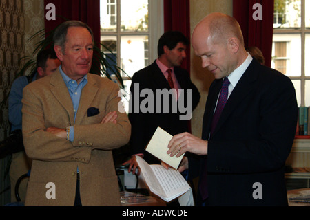 Journalist Newsreader Michael Buerk chats with William Hague former Conservative leader at the Cheltenham Literature Festival Stock Photo