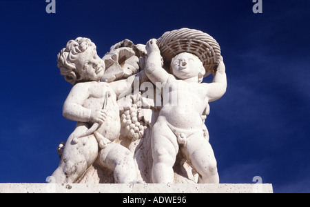 Cherubs In The Courtyard Of The Palace In Aranjuez In Spain Stock Photo