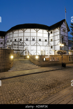 Dusk view of Shakespeare's Globe theatre on the south bank of the Thames river in London. Stock Photo