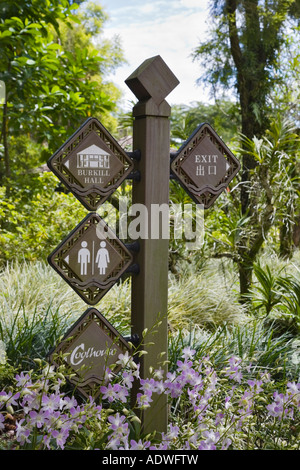 A sign pointing the way to an open garden on a frosty winter day in ...