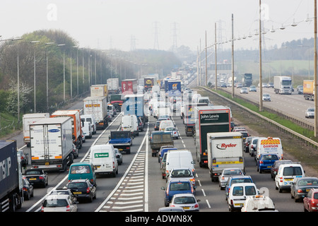 Congested traffic travelling on M1 motorway in Hertfordshire United Kingdom Stock Photo