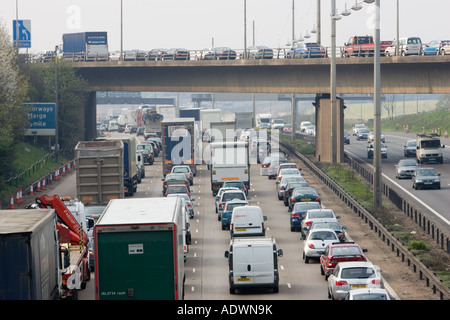 Heavy weight of traffic travelling on M1 motorway in Hertfordshire United Kingdom Stock Photo