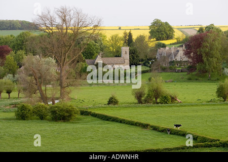 Asthall Manor House village and Church of St Nicholas in The Cotswolds Oxfordshire United Kingdom Stock Photo