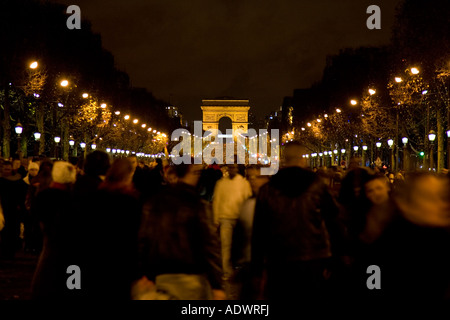 People gather for New Year s Eve celebrations in Champs Elysees by the Arc de Triomphe Paris France Stock Photo