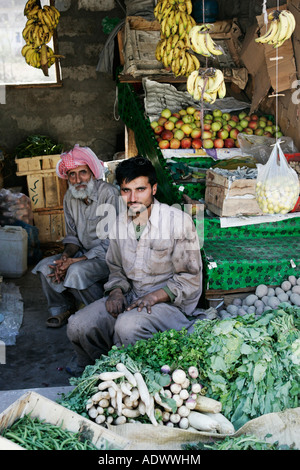 Pakistani fruit and vegetable sellers in village of Pattika Pakistan Stock Photo