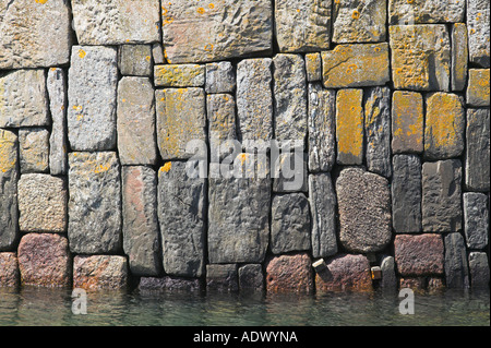 The old harbour wall at Portsoy, Aberdeenshire, Scotland. Stock Photo