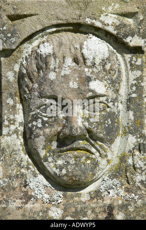 Face on a sundial in the walled garden of Crathes Castle, Aberdeenshire, Scotland Stock Photo