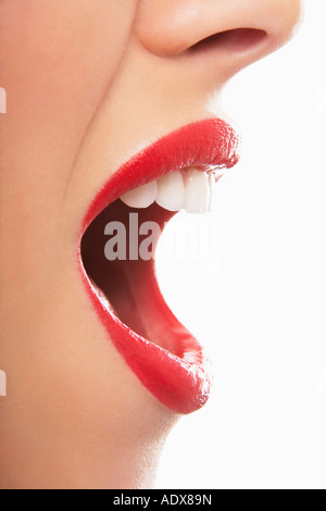 Woman's open red lips, yelling Stock Photo