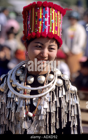 Portrait of a young Kachin tribal woman at a Manao (festival) in Northern Burma/Myanmar, wearing traditional costume & jewelry, Stock Photo