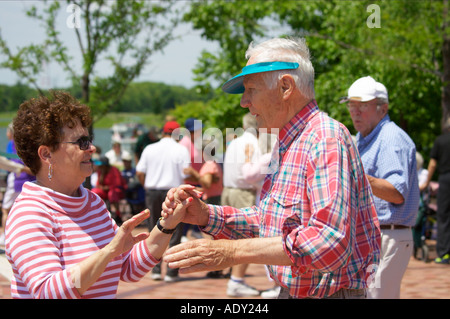 EVENTS Libertyville Illinois Couples dance outdoors during Seniors Day Independence Grove facility Stock Photo